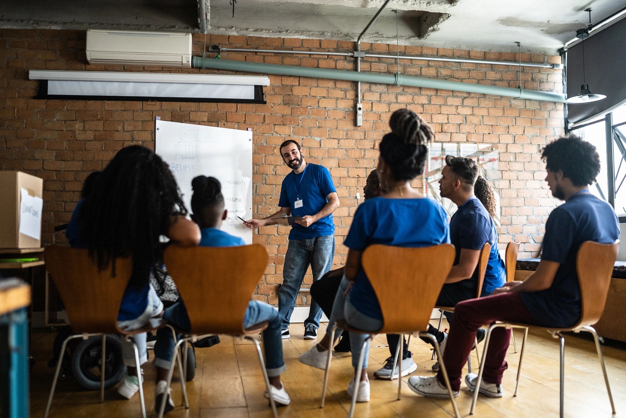 Community leader speaking during a nonprofit meeting